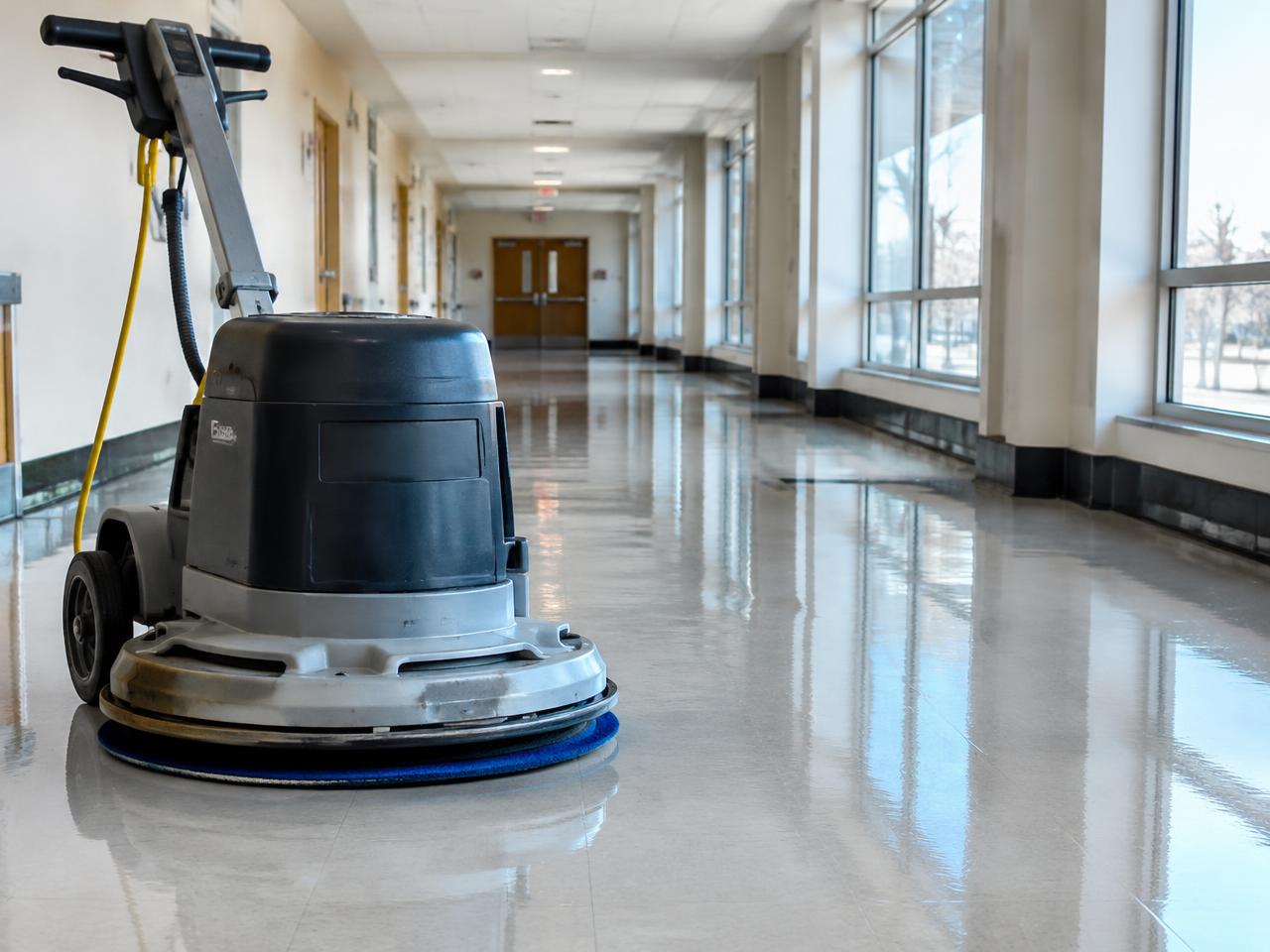 Freshly scrubbed commercial corridor floor
